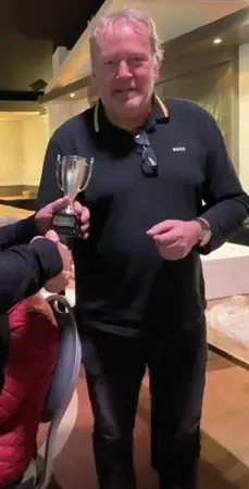 Rian Snoek receiving the trophy N.M.G.