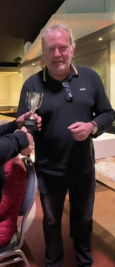 Rian Snoek receiving the trophy N.M.G.